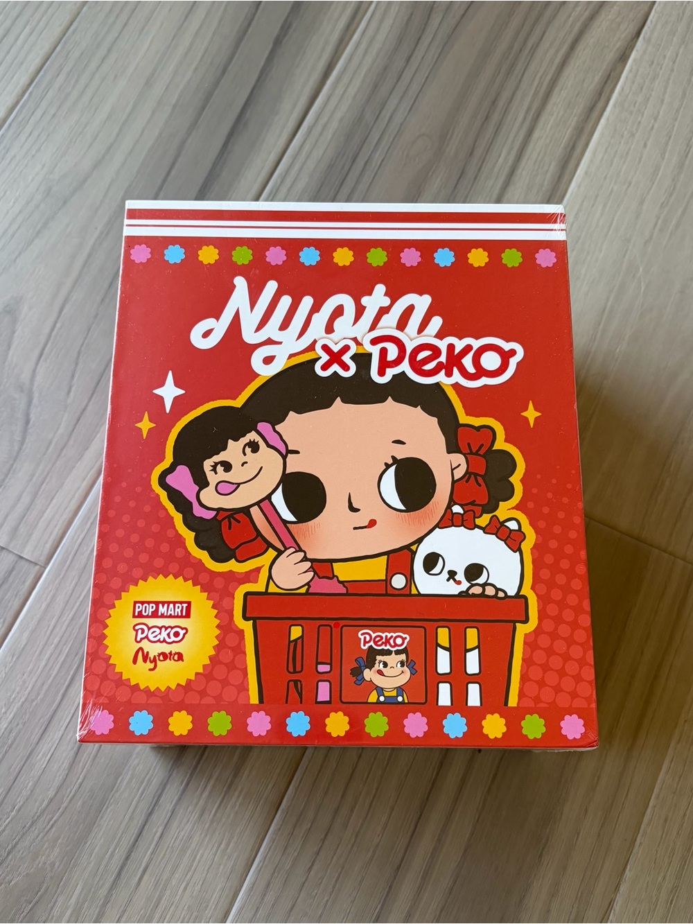 Pop Mart NYOTA x Peko Figurine